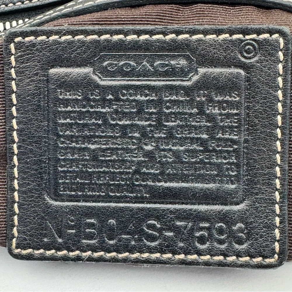 Coach Vintage Hampton Demi Hobo. Smooth, soft black leather. Crescent shape.